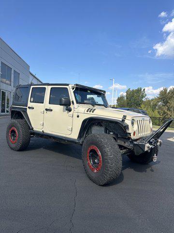 used 2011 Jeep Wrangler Unlimited car, priced at $33,990