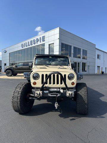 used 2011 Jeep Wrangler Unlimited car, priced at $33,990