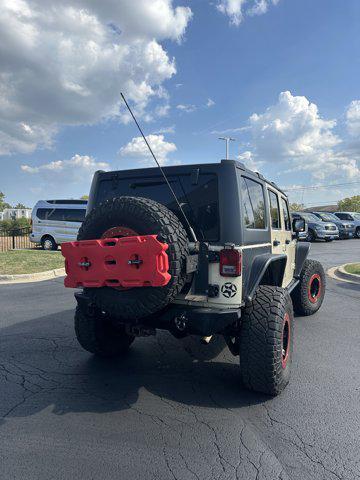 used 2011 Jeep Wrangler Unlimited car, priced at $33,990