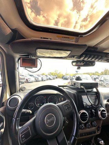 used 2011 Jeep Wrangler Unlimited car, priced at $33,990