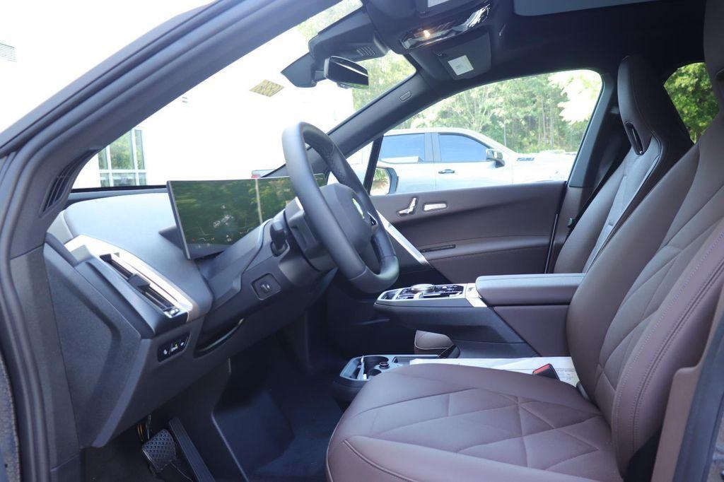 new 2026 BMW iX car, priced at $98,095