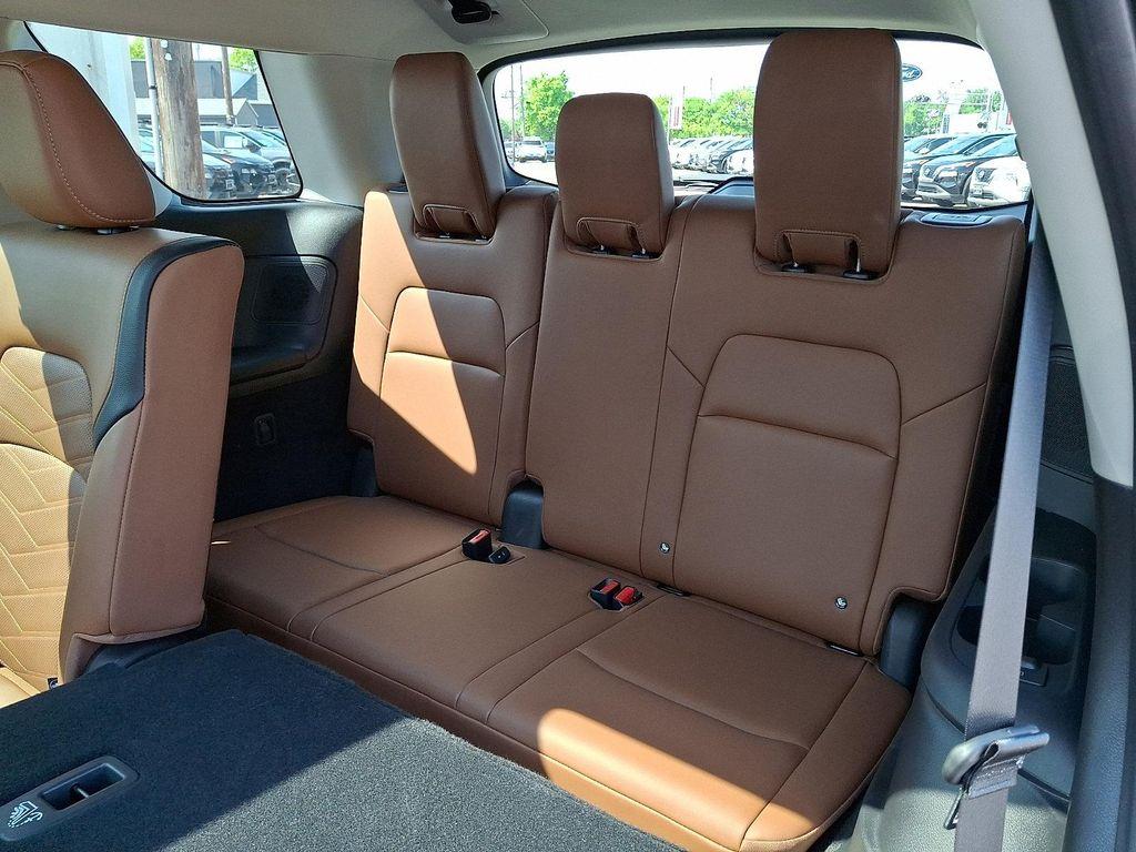 used 2025 Nissan Pathfinder car, priced at $40,348