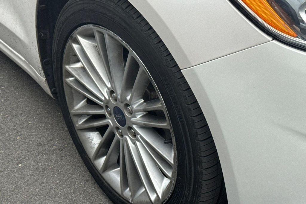 used 2015 Ford Fusion car, priced at $7,988
