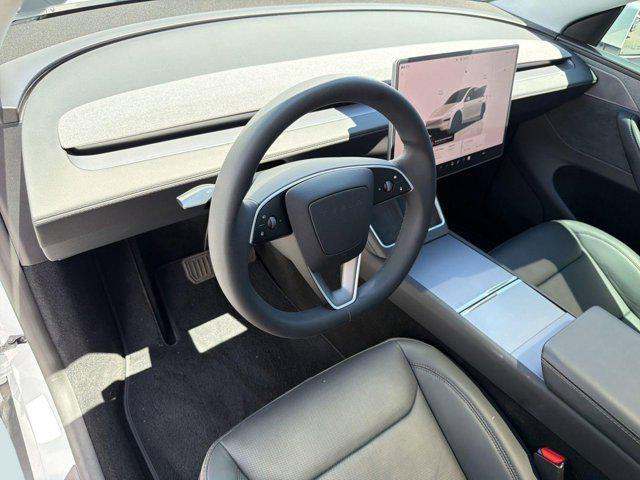 used 2026 Tesla Model Y car, priced at $46,698