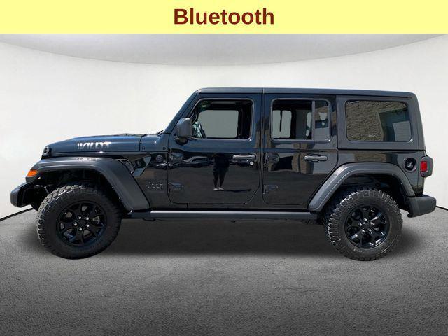 used 2021 Jeep Wrangler Unlimited car, priced at $29,647