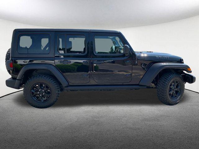 used 2021 Jeep Wrangler Unlimited car, priced at $29,647