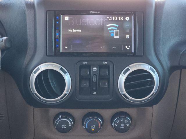 used 2013 Jeep Wrangler Unlimited car, priced at $13,494