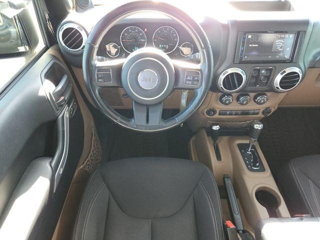 used 2013 Jeep Wrangler Unlimited car, priced at $13,494