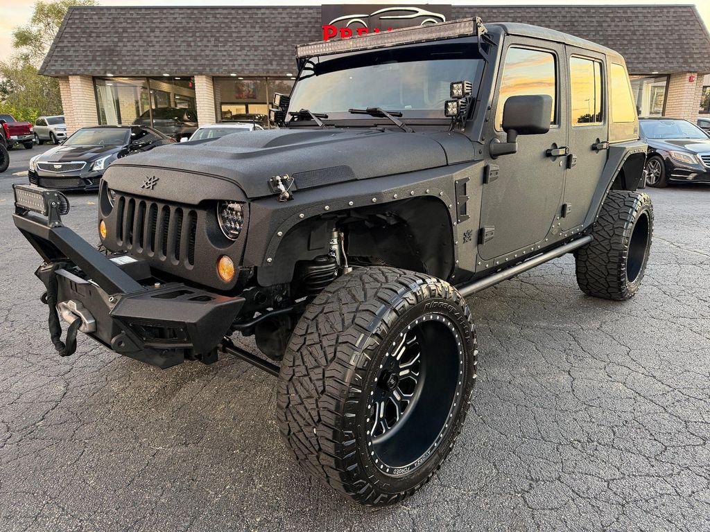 used 2015 Jeep Wrangler Unlimited car, priced at $25,987