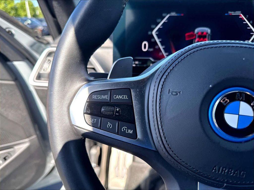 used 2023 BMW 330e car, priced at $38,082