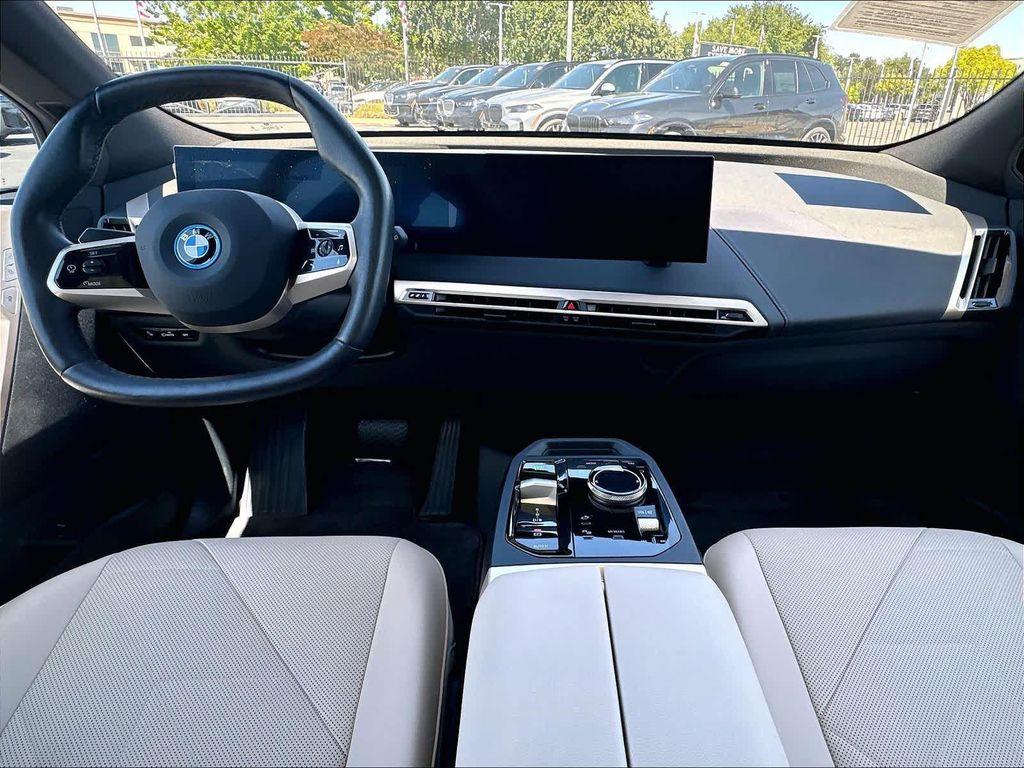 used 2024 BMW iX car, priced at $53,077