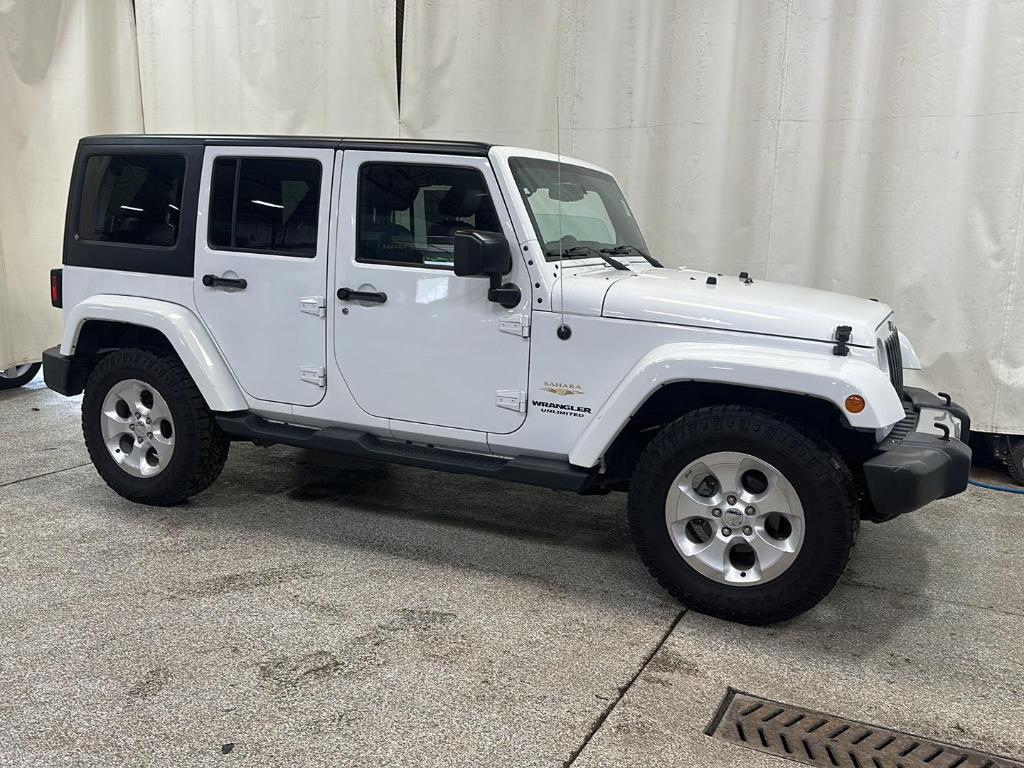 used 2015 Jeep Wrangler Unlimited car, priced at $19,699