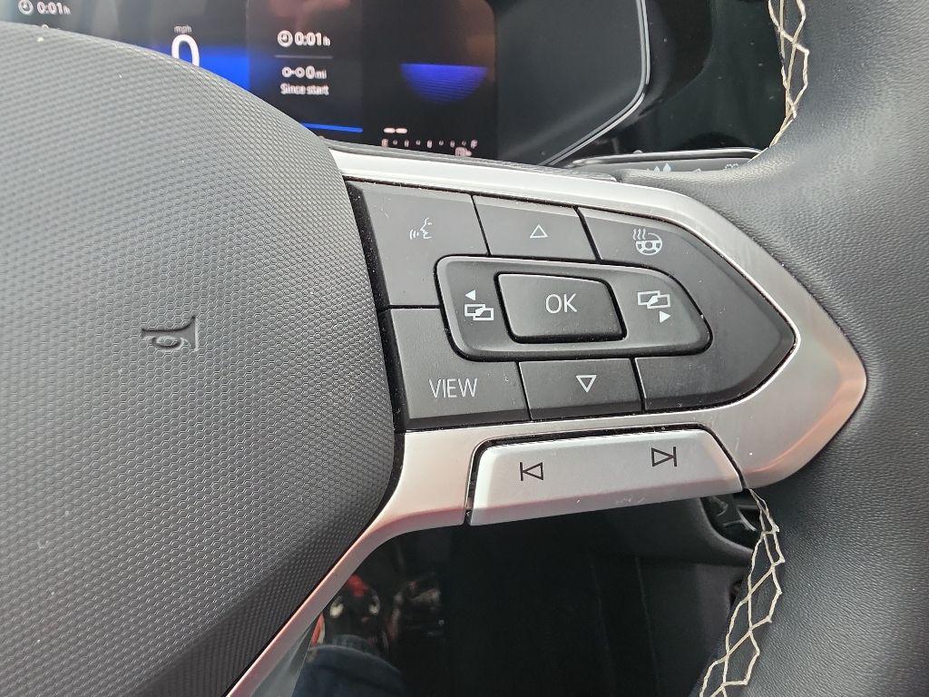 used 2023 Volkswagen Taos car, priced at $23,139