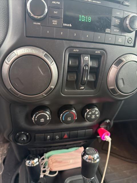 used 2016 Jeep Wrangler Unlimited car, priced at $19,580