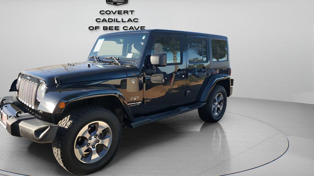 used 2018 Jeep Wrangler JK Unlimited car, priced at $20,628