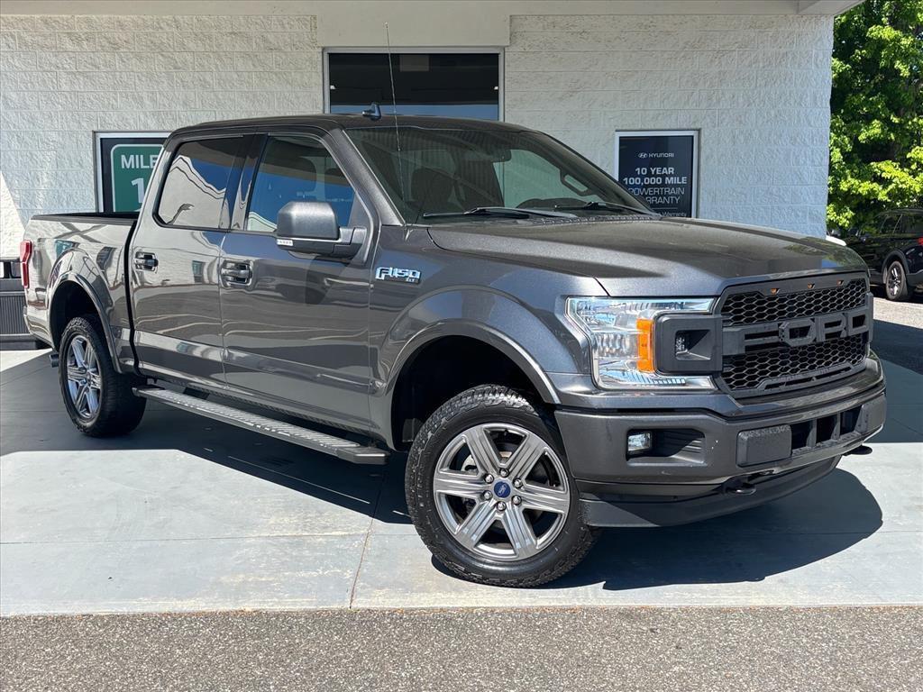 used 2018 Ford F-150 car, priced at $23,339