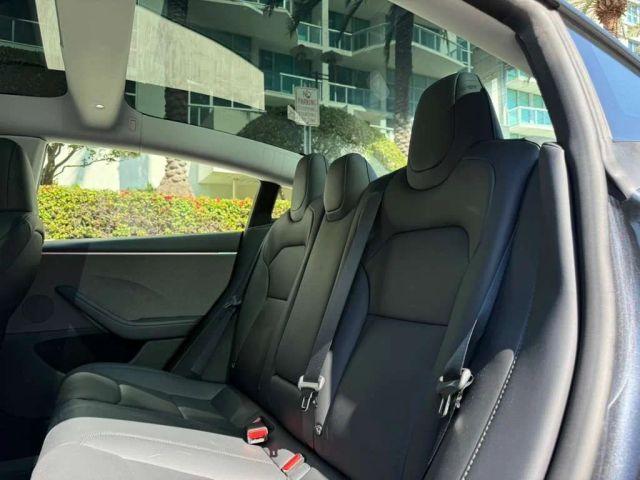 used 2025 Tesla Model 3 car, priced at $33,991