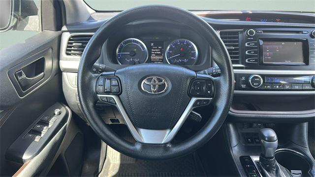 used 2019 Toyota Highlander Hybrid car, priced at $14,100