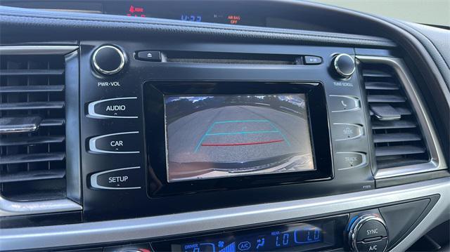 used 2019 Toyota Highlander Hybrid car, priced at $14,100