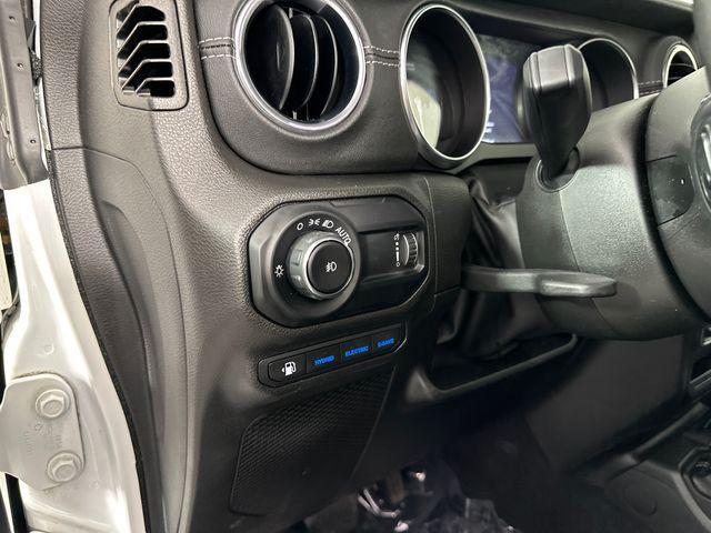 used 2023 Jeep Wrangler 4xe car, priced at $30,167