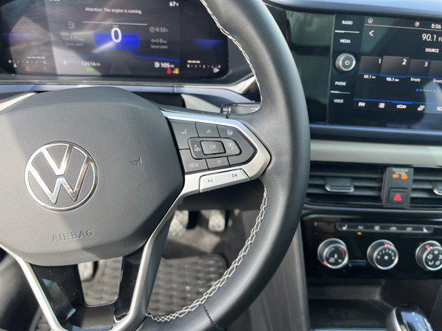 used 2023 Volkswagen Taos car, priced at $24,571