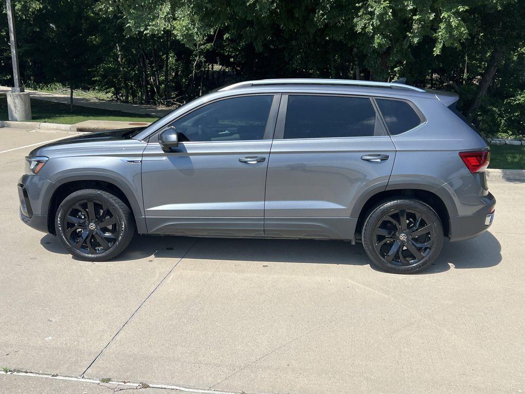 used 2023 Volkswagen Taos car, priced at $22,196