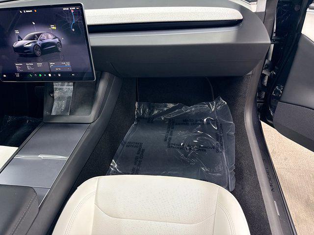 used 2025 Tesla Model 3 car, priced at $38,065
