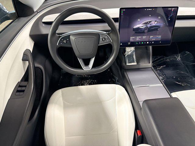 used 2025 Tesla Model 3 car, priced at $38,065
