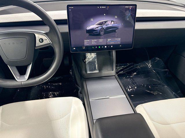 used 2025 Tesla Model 3 car, priced at $38,065
