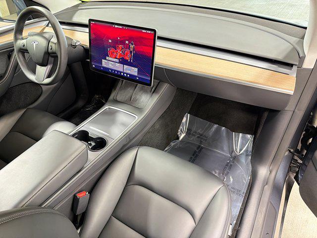used 2024 Tesla Model Y car, priced at $33,452