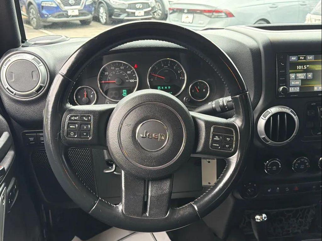 used 2015 Jeep Wrangler Unlimited car, priced at $15,892