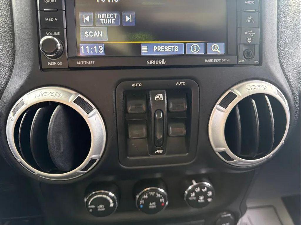 used 2015 Jeep Wrangler Unlimited car, priced at $15,892