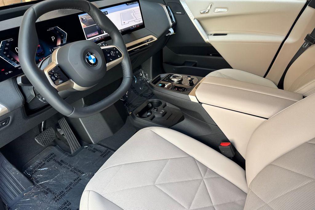 new 2026 BMW iX car, priced at $87,345