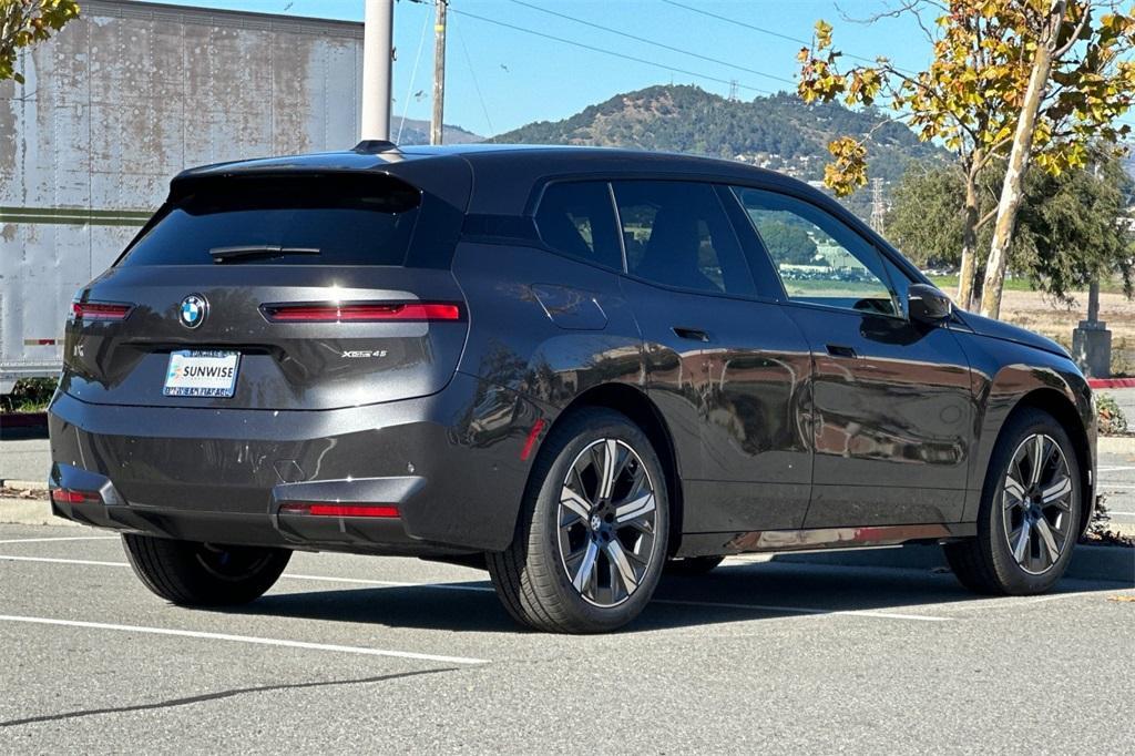new 2026 BMW iX car, priced at $89,125