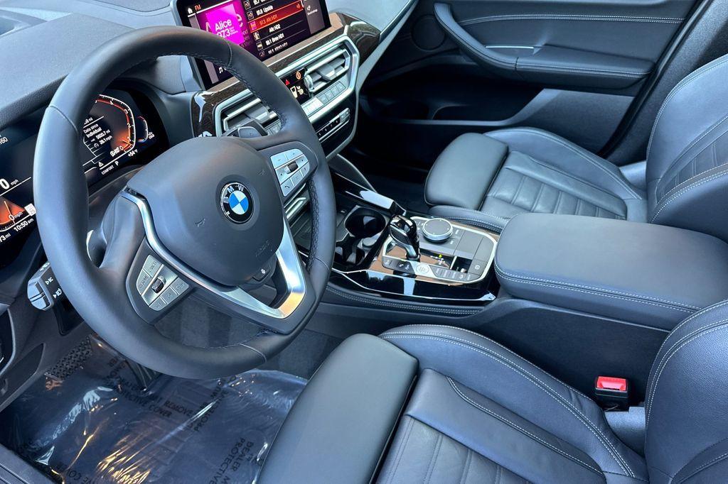 used 2025 BMW X4 car, priced at $49,488