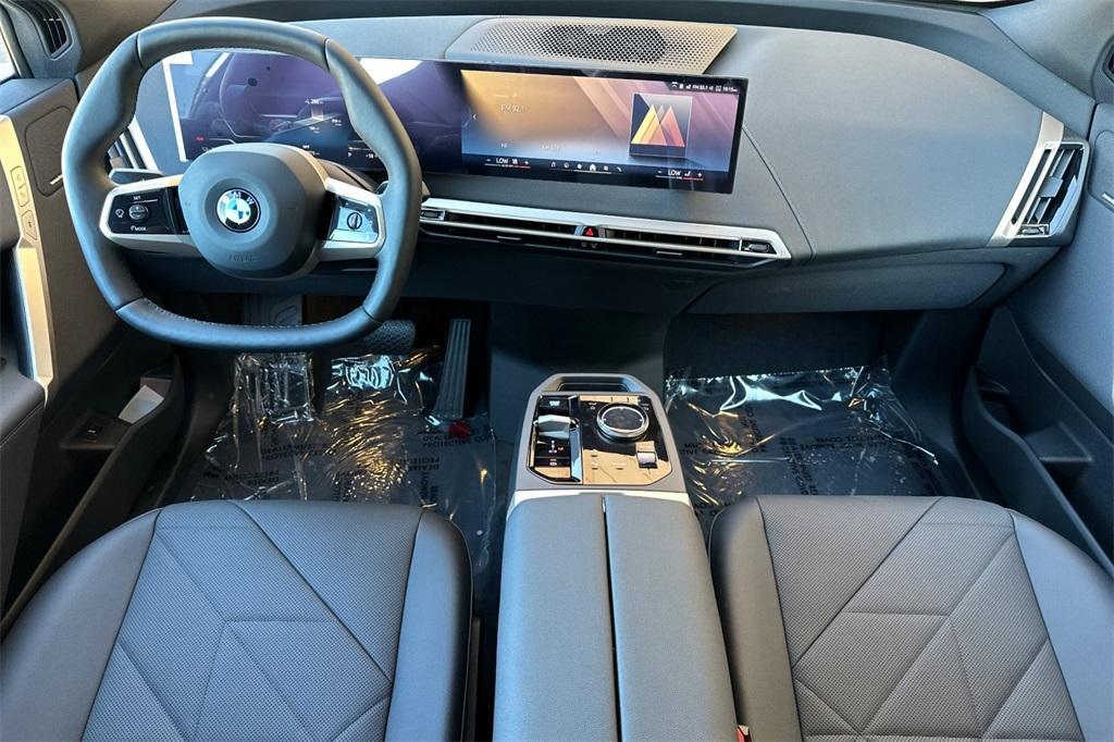 new 2026 BMW iX car, priced at $86,675