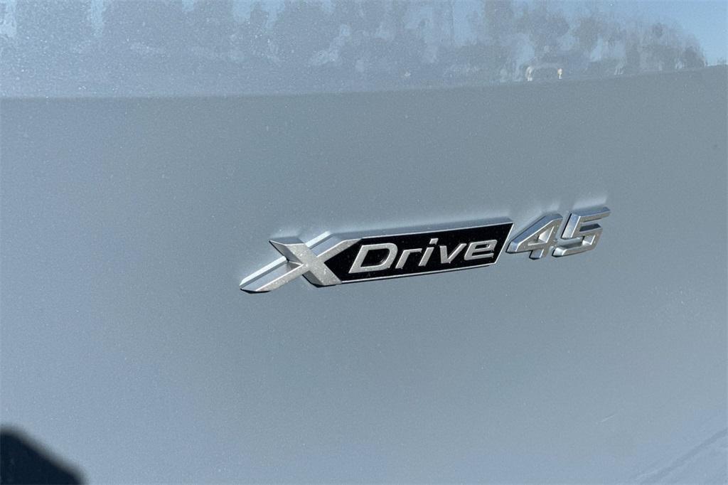 new 2026 BMW iX car, priced at $86,675