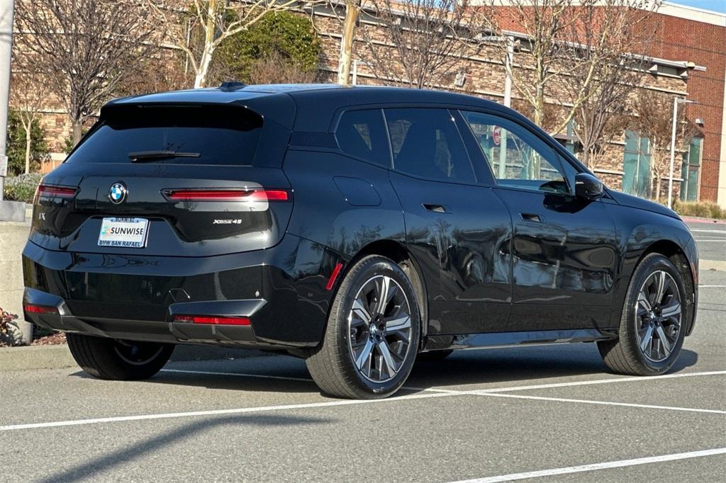 new 2026 BMW iX car, priced at $82,695