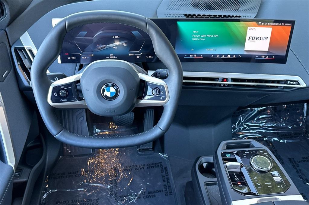 new 2026 BMW iX car, priced at $86,675