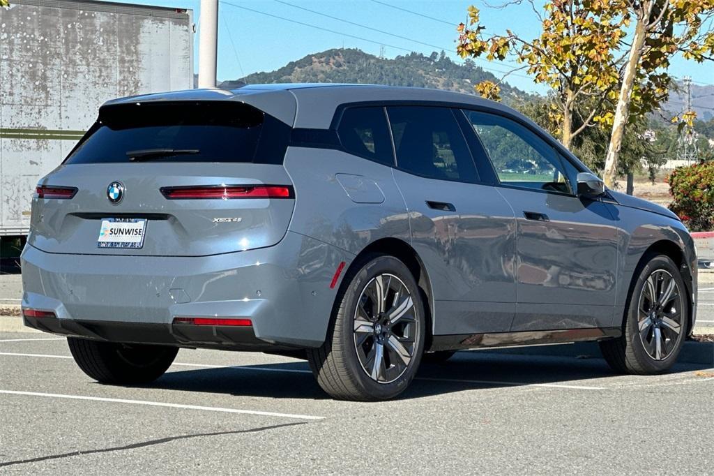 new 2026 BMW iX car, priced at $86,675