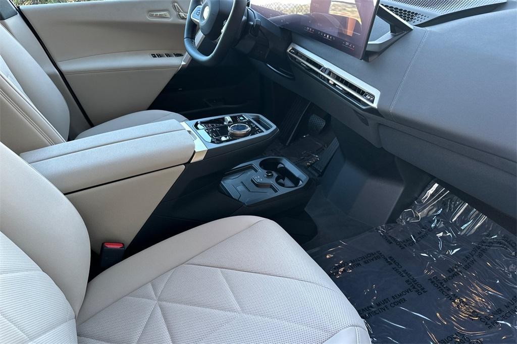 new 2026 BMW iX car, priced at $97,825