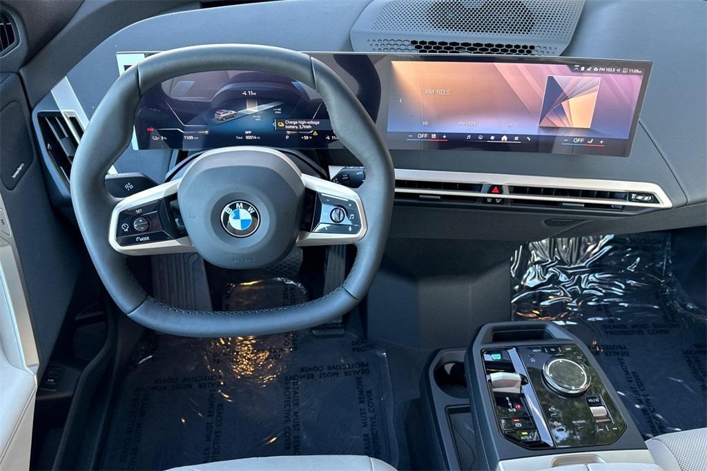 new 2026 BMW iX car, priced at $97,825