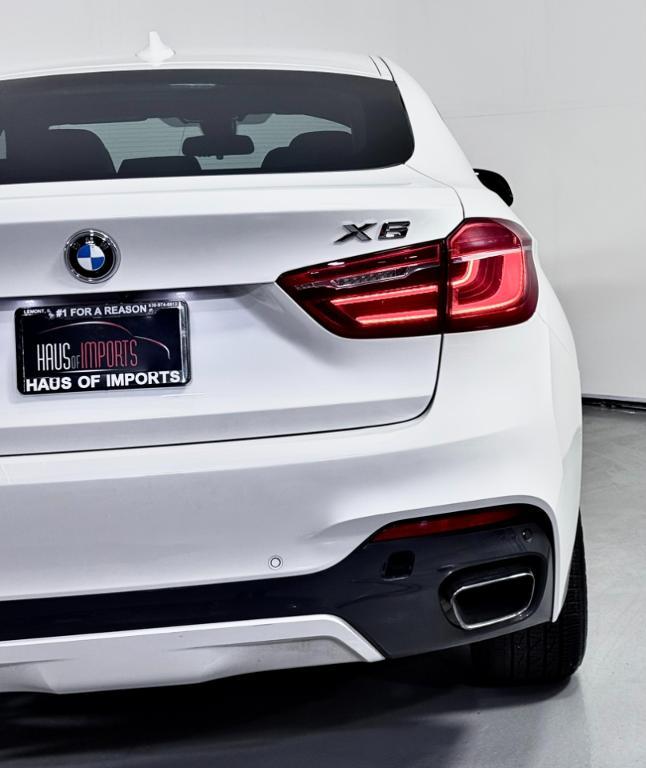 used 2019 BMW X6 car, priced at $28,900