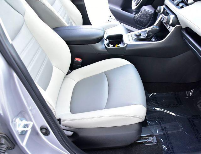 used 2021 Toyota RAV4 Hybrid car, priced at $27,385