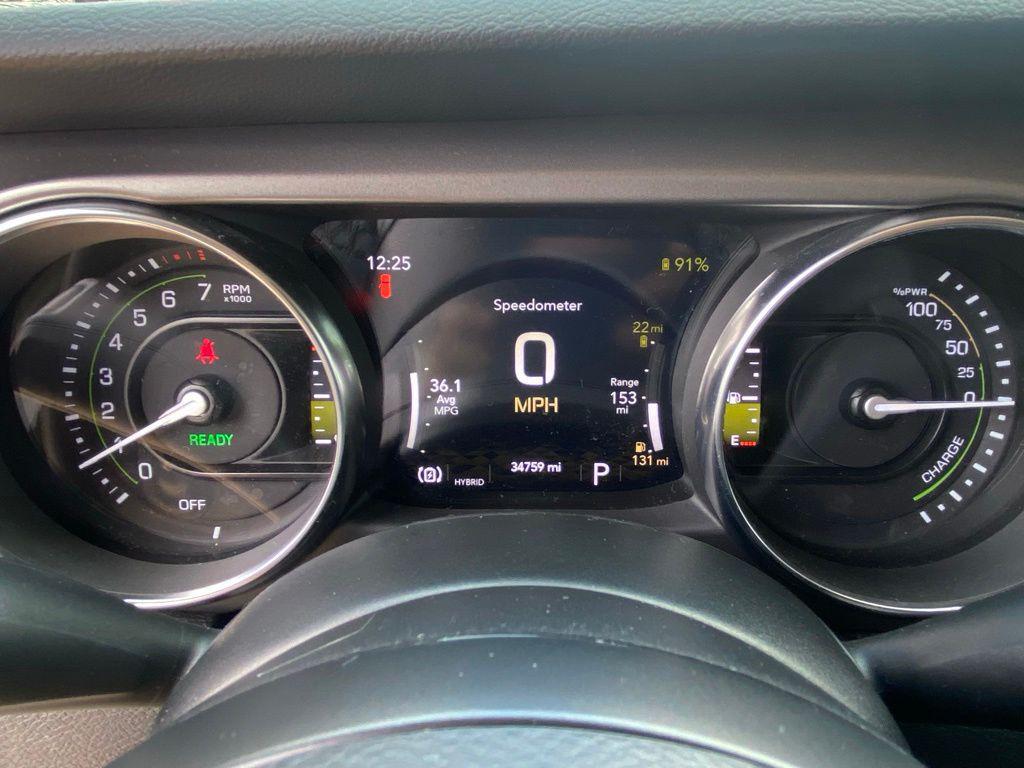 used 2023 Jeep Wrangler 4xe car, priced at $29,834
