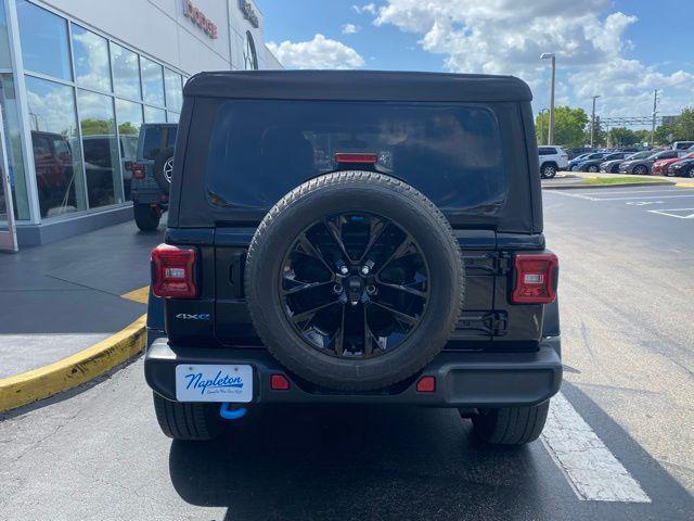 used 2023 Jeep Wrangler 4xe car, priced at $29,875