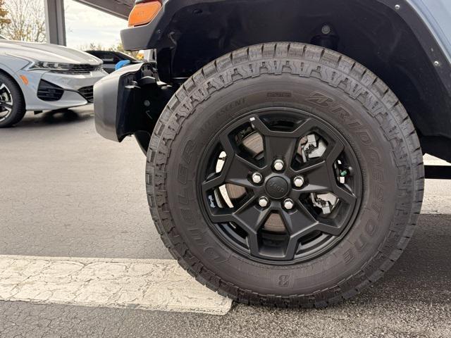 used 2023 Jeep Wrangler 4xe car, priced at $25,663
