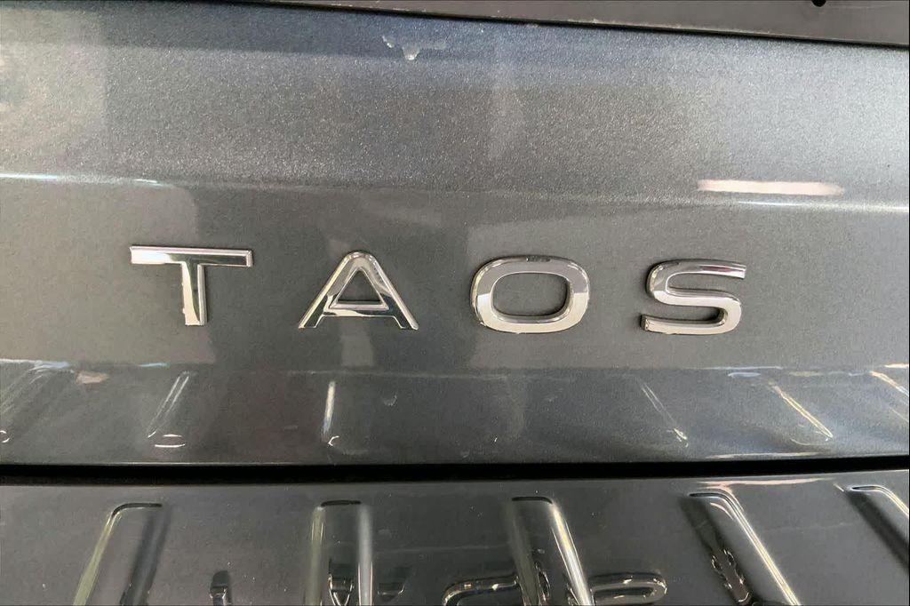 used 2023 Volkswagen Taos car, priced at $21,390