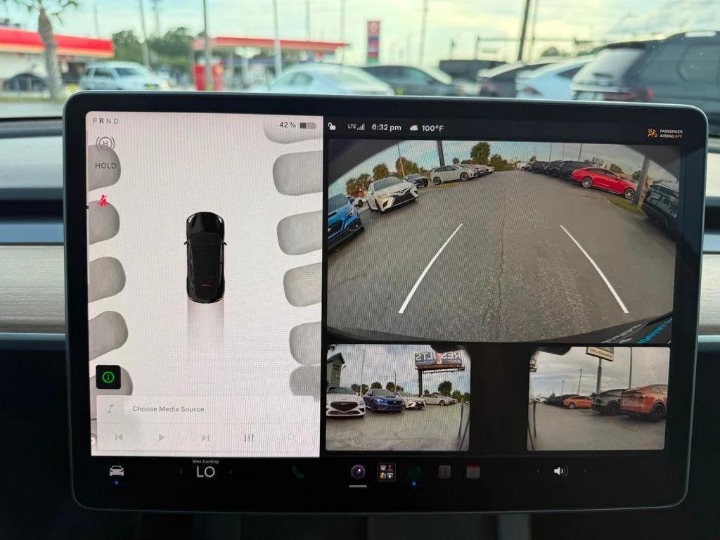 used 2023 Tesla Model Y car, priced at $32,495
