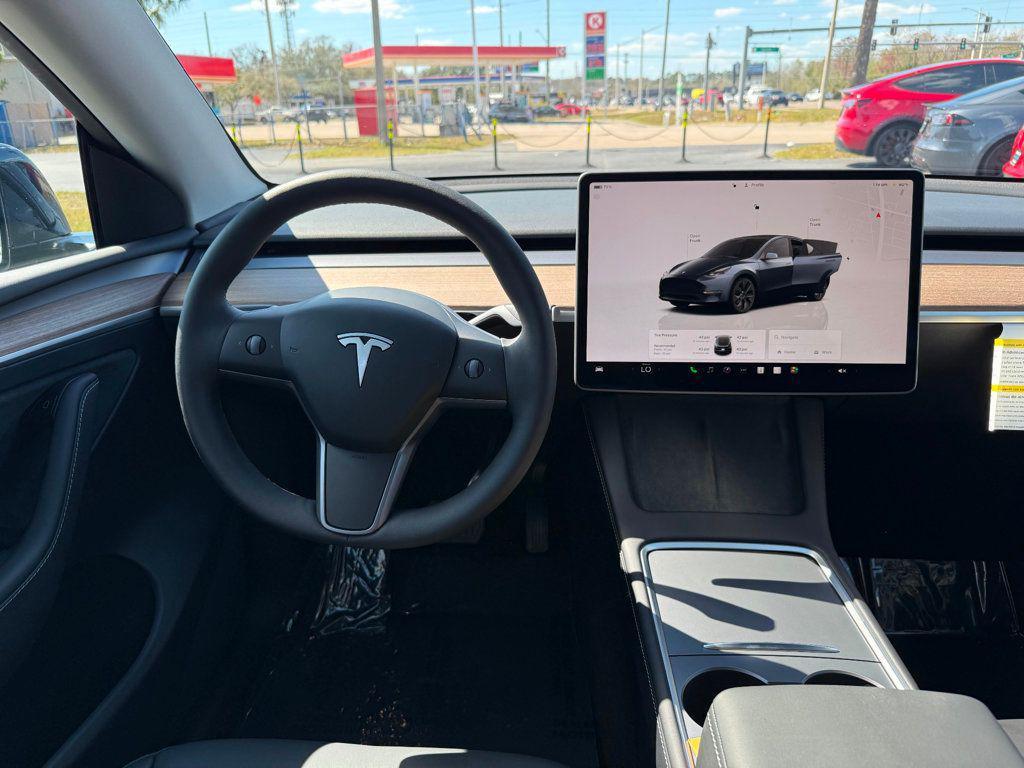 used 2025 Tesla Model Y car, priced at $41,991